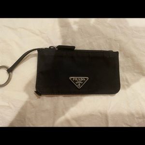 Authentic pride nylon key credit card pouch. Has fabric on the corner